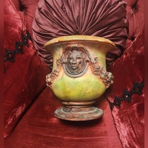 Vintage lion urn planter.